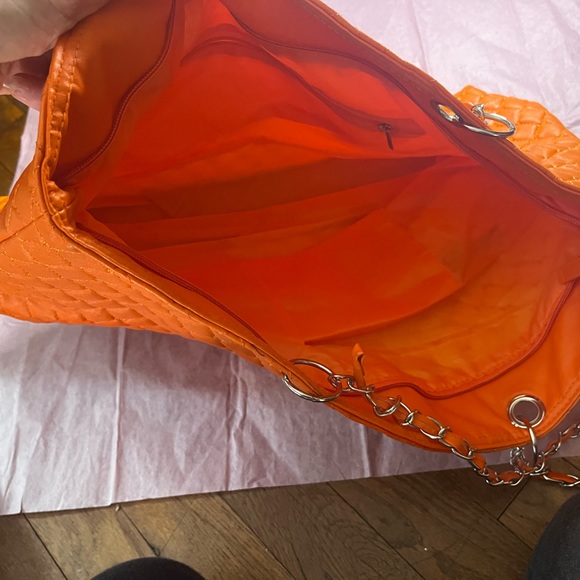 This is a slightly bright orange bag - Picture 3 of 3